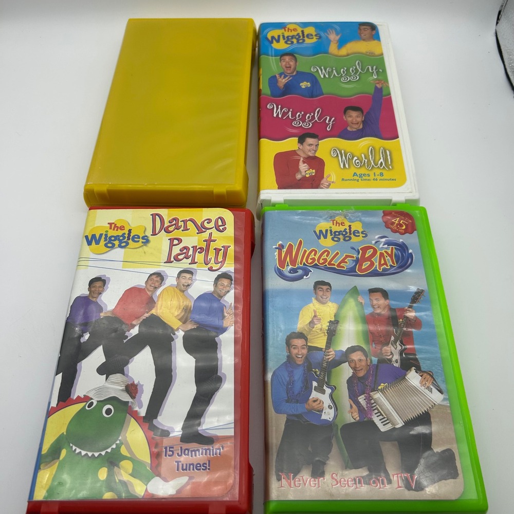 The Wiggles VHS Lot of 4 Dance Party Wiggle Bay Wiggly World Magical Adventure